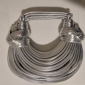 Metallic Silver Statement Clutch Wristlet with Knotted Detail